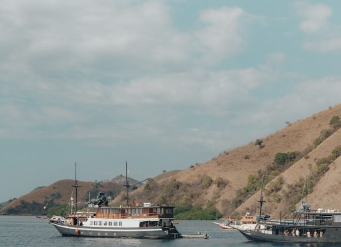 a group of people on a boat in the water