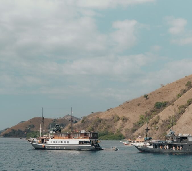 a group of people on a boat in the water